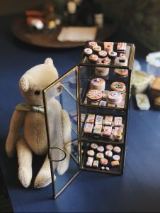 Teddy bear and miniature baked goods